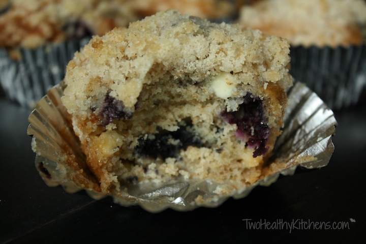 These make-over Blueberry-White Chocolate Muffins are a blissfully decadent indulgence ... without all the guilt! So unbelievably scrumptious – yet full of healthy upgrades like whole wheat flour and much less fat, plus plenty of super-nutritious blueberries. These white chocolate muffins are a great breakfast, grab-n-go snack or even a healthy dessert. And, they freeze well, too! | www.TwoHealthyKitchens.com