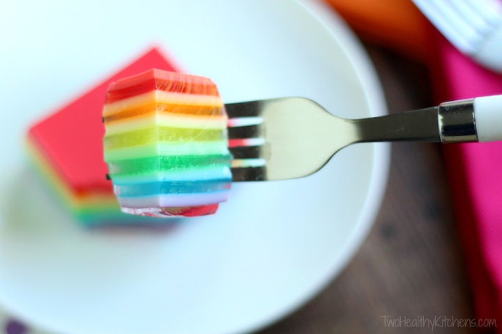 closeup of a forkful, laying on its side on the tines of the fork so you can see the alternating cloudy and clear rainbow layers
