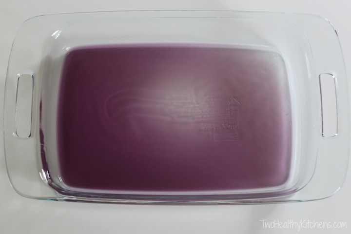overhead of the pan with a clear purple layer setting up 