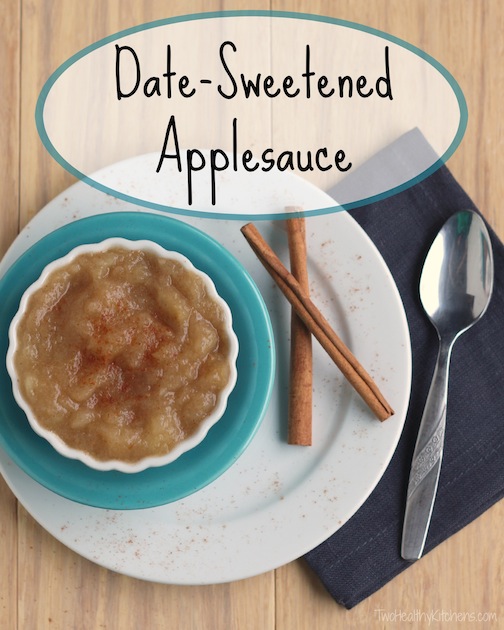 Pinnable overhead of a serving of this applesauce with two cinnamon sticks, a spoon and napkin and a text overlay of the recipe name.