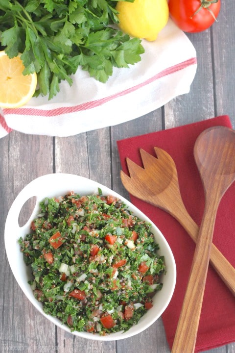 Just a few simple ingredients - so easy! This Kale and Quinoa Tabouli Salad has all the bright flavors you expect in tabouli, plus super-healthy kale (you won’t even taste it - seriously!), and gluten-free quinoa instead of bulgur wheat! Makes a big batch and keeps really well – a perfect make-ahead recipe! | www.TwoHealthyKitchens.com
