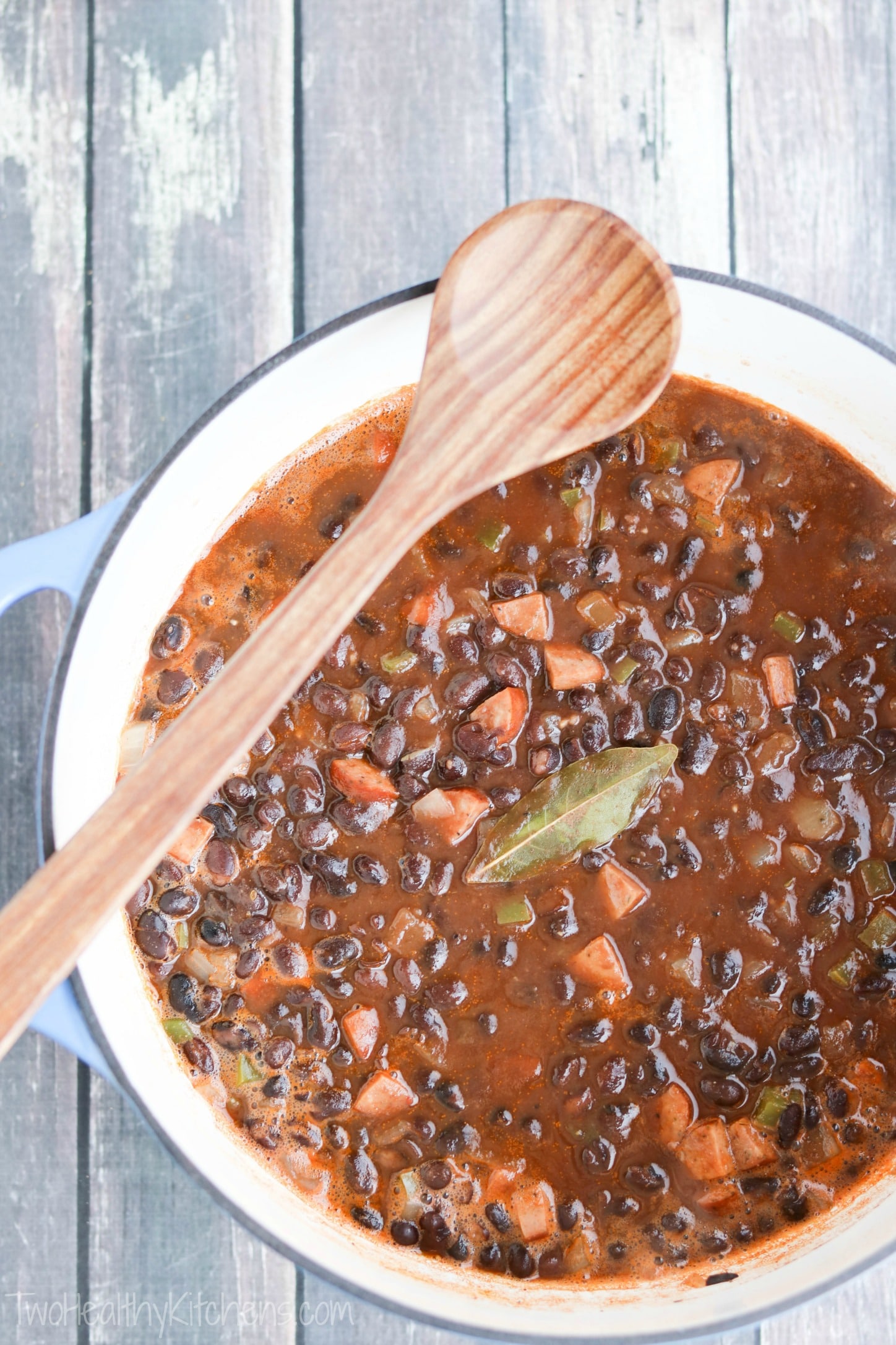 This Easy Black Bean Soup is rich, hearty and filling - and cooks in just 20 minutes! And those crispy-crunchy Cumin-Dusted Bread Bowls? You'll have 'em in the oven in 3 minutes, flat ... and you can even make them days in advance! AD | www.TwoHealthyKitchens.com