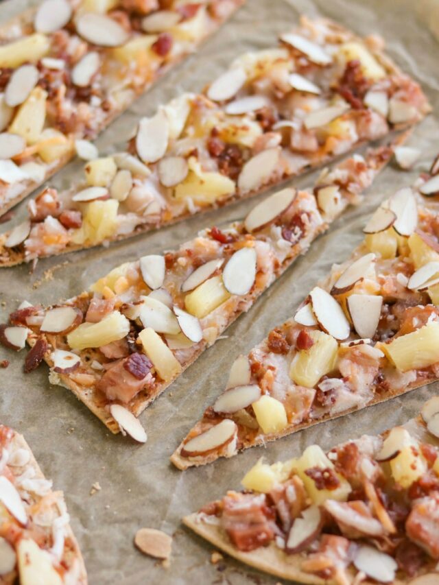 Closeup of triangular slices on brown parchment.