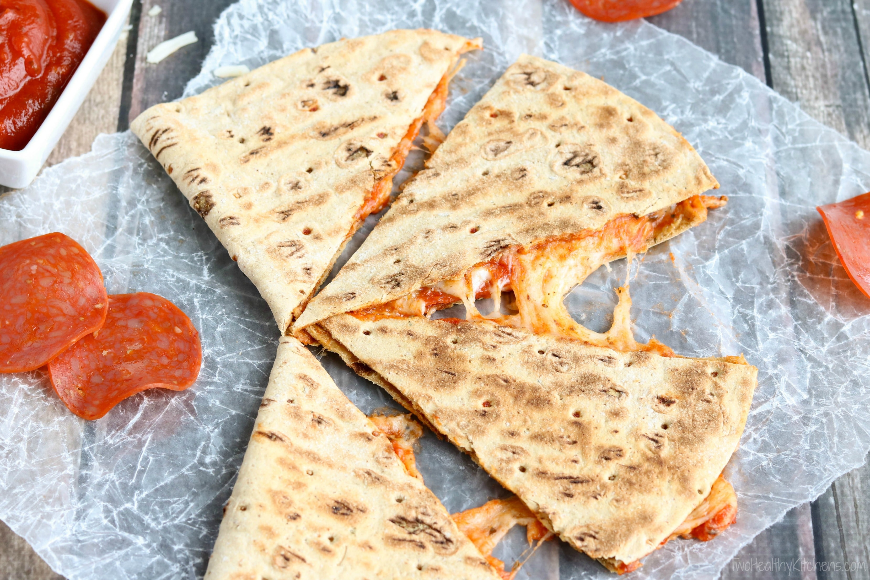 This easy Pepperoni Pizza Quesadilla recipe takes just minutes! With fiber-rich whole grains and lots of protein, it’s perfect as a quick meal or a hearty power snack! {ad} | www.TwoHealthyKitchens.com