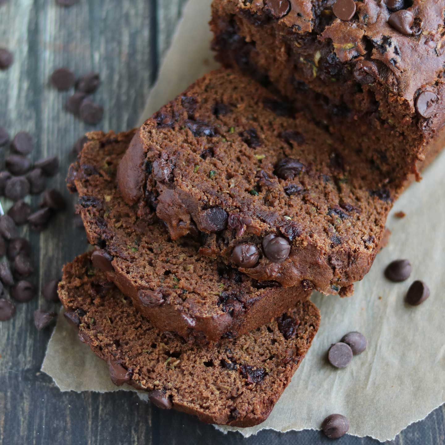 Luscious cherries & two layers of chocolate flavor! This decadent, rich Chocolate Zucchini Bread is dense, luxuriously moist, and studded with chocolate chips. Truly a chocolate lover's dream! And it’s a healthy zucchini bread recipe full of whole grains and very little extra fats! For quicker baking, this is a perfect zucchini muffin recipe, too! And this easy zucchini bread freezes beautifully – make a double batch to freeze for later, or to give as homemade gifts! | www.TwoHealthyKitchens.com