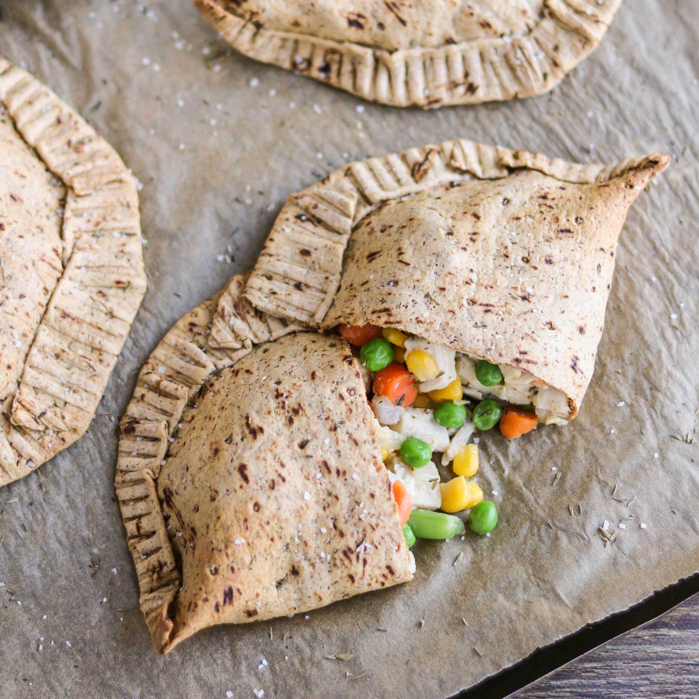 These Chicken Pot Pie Pockets have all the comforting, homestyle goodness of traditional chicken pot pies, but are so healthy and totally portable! You’ll love these yummy hand pies – and your kids will, too!