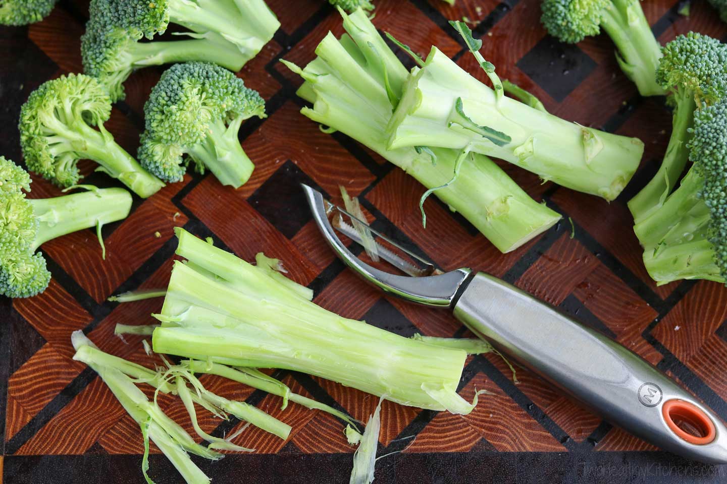 Peeling broccoli stalks helps to remove some of the tough outer layer. The stems of broccoli are tender near the florets and may not even need to be peeled at all, but it’s helpful to remove the tough outer layer further down near the base of each broccoli stalk.