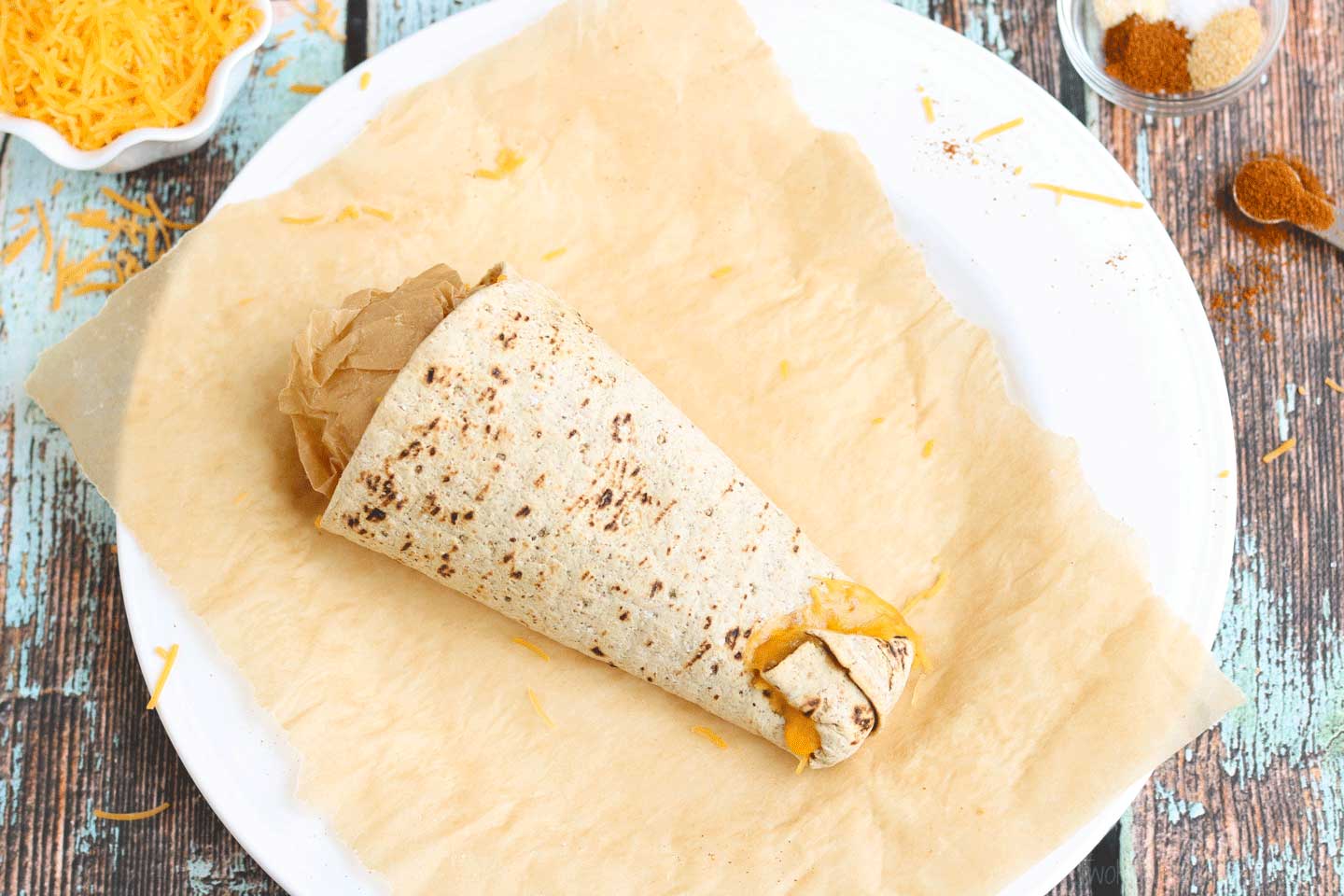 Then, fold the tip of the cone up and secure it in the melted cheese. Presto … you just made your very own DIY Taco Cone!