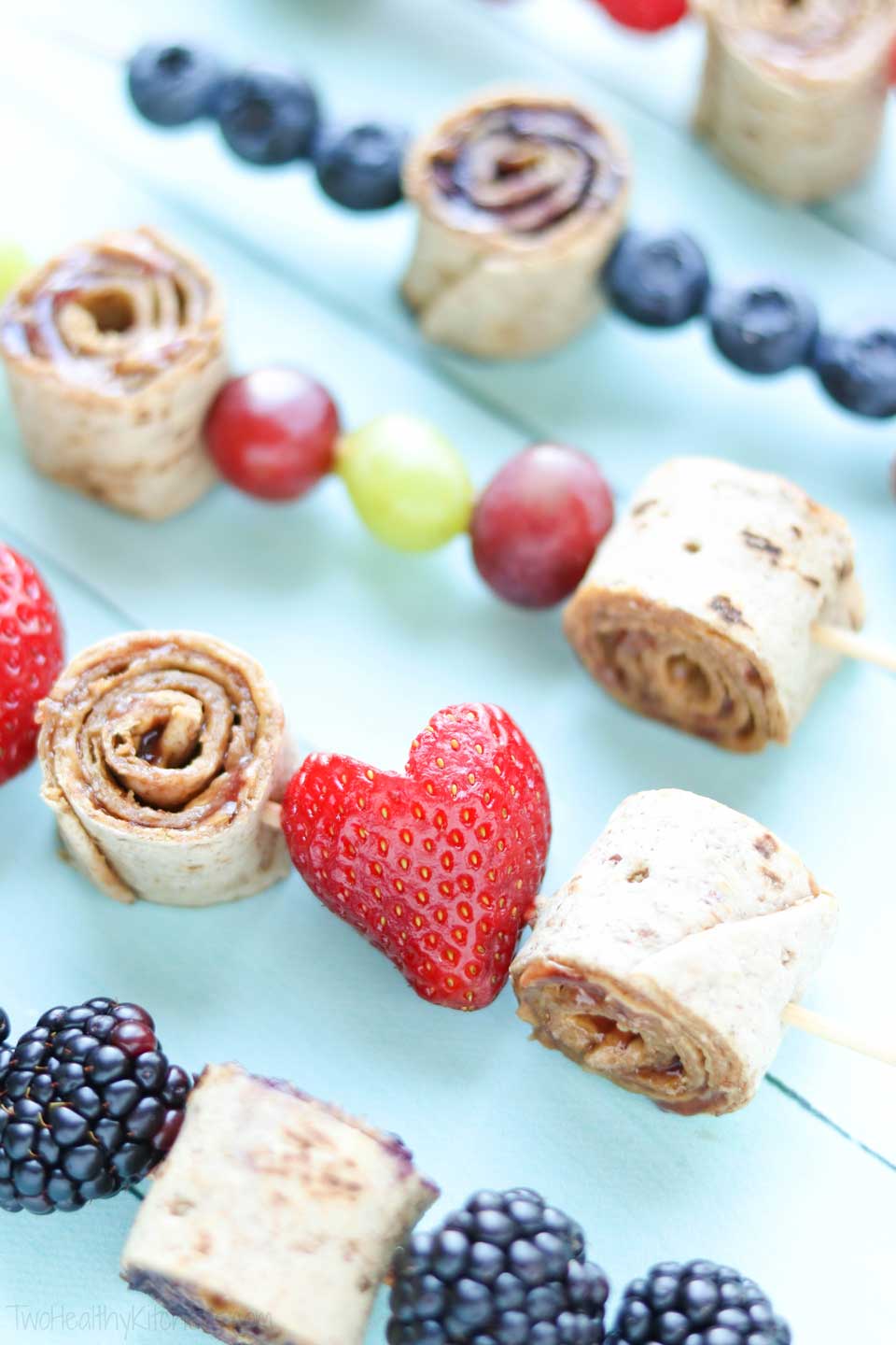 Easy strawberry hearts really share the love with these sandwich skewers, but you can mix and match all sorts of different fruits, jellies, and nut butters (or nut-free butters)!
