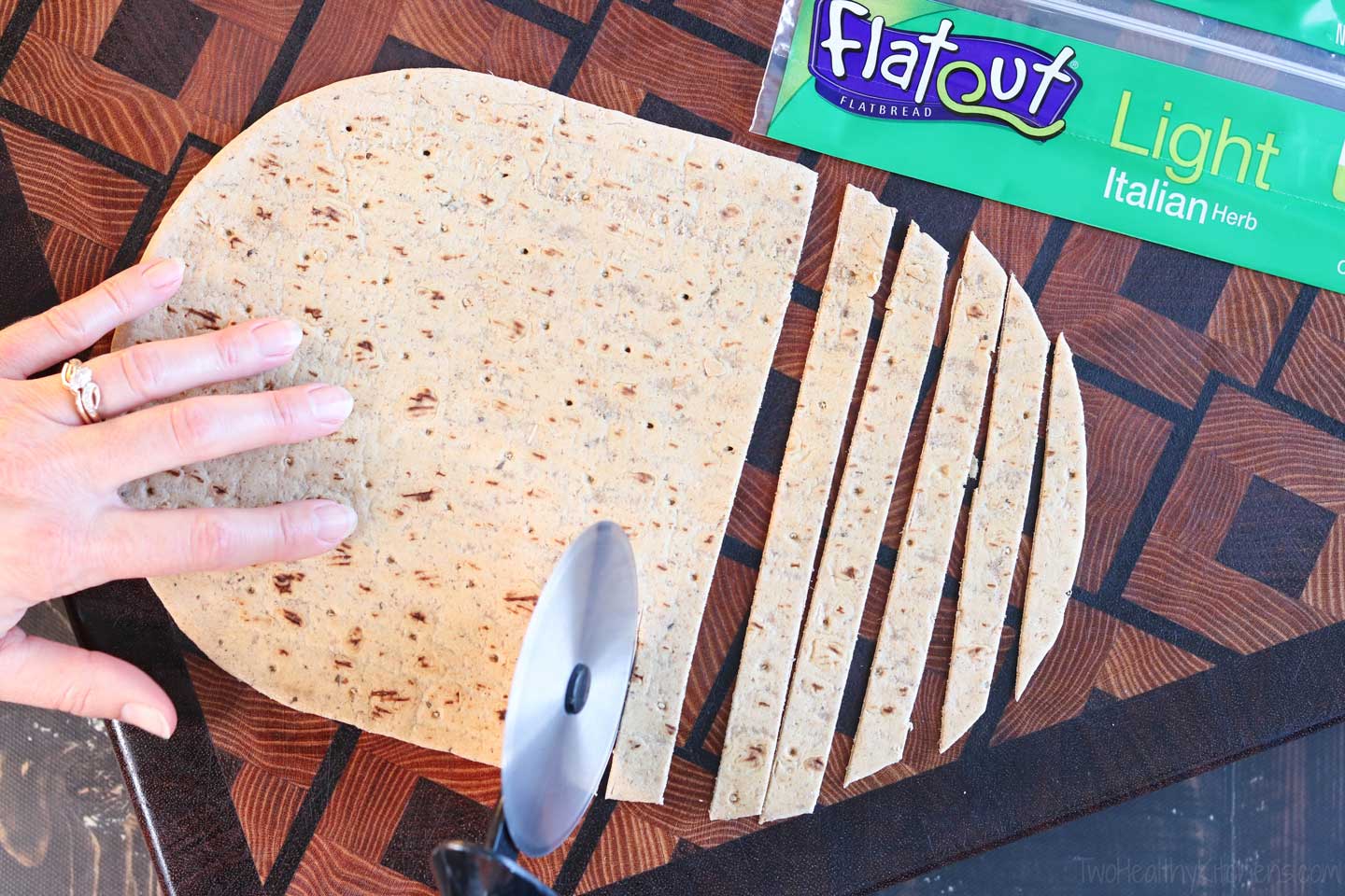 Making the flatbread croutons is easy! Just cut flatbreads into squares before toasting!
