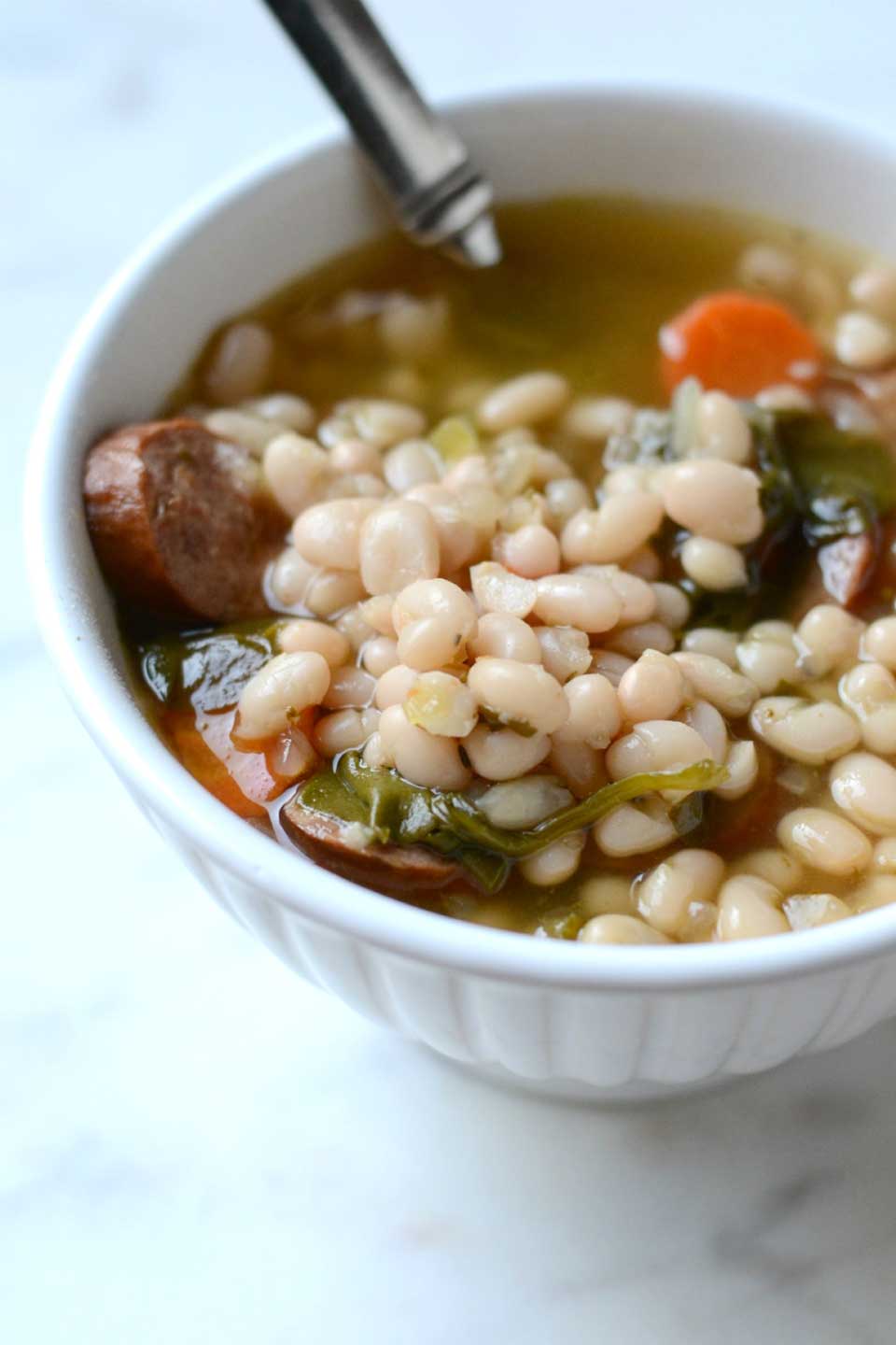 Instant Pot Soup with Smoked Sausage, White Beans & Vegetables from Alyssa at Good + Simple is just one of the quick and delicious Instant Pot soup recipes we’ve got line up for you – be sure to check them all out!