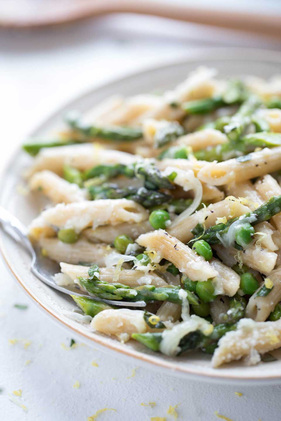 In this vegetarian one-pot recipe, whole-wheat pasta is cooked all together with crisp-tender asparagus and sweet peas, then accented with savory parmesan, bright lemon, and fresh tarragon. It’s all draped in a light sauce that’s the perfect finishing touch!