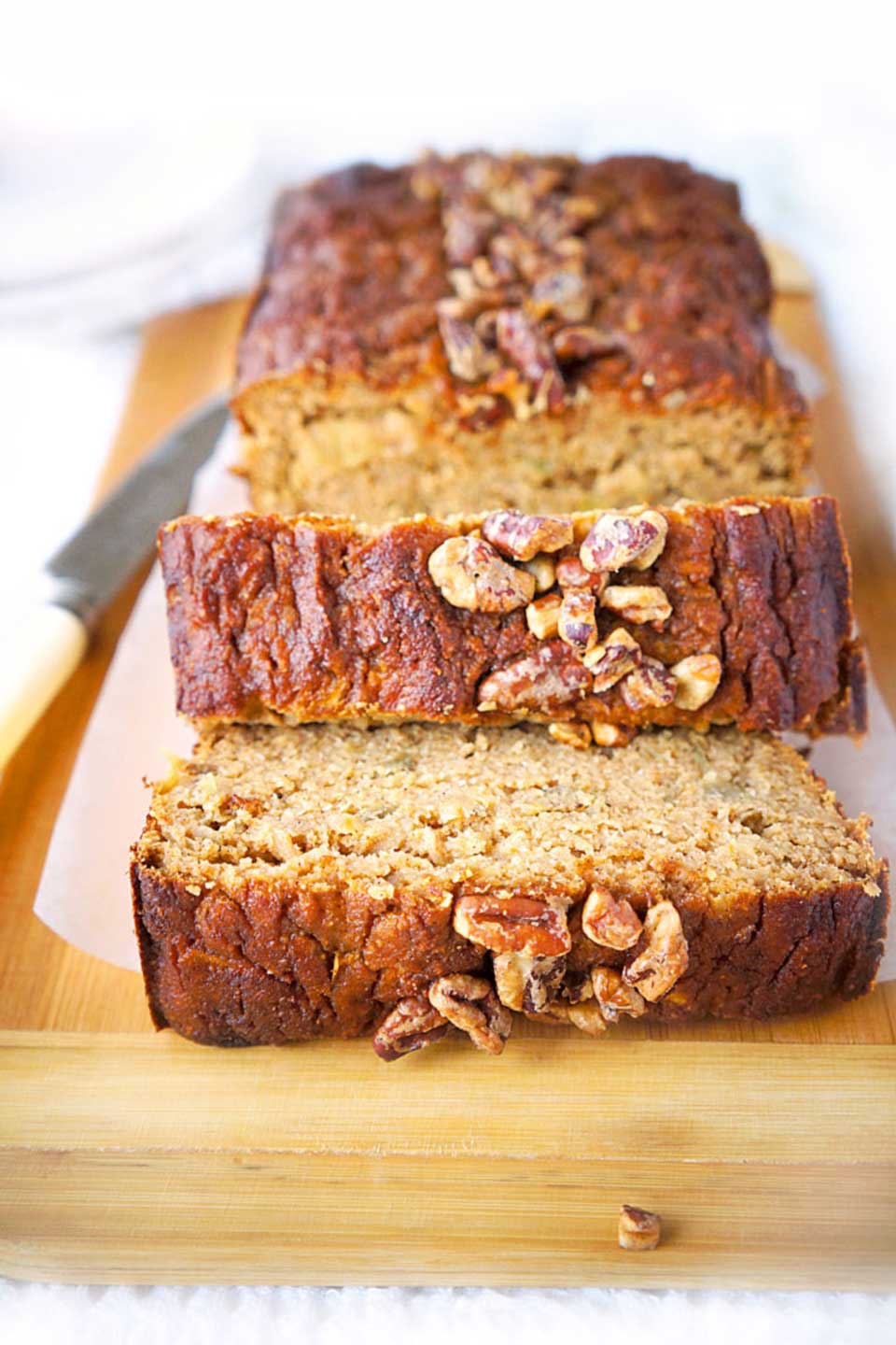 Healthier but so decadently delicious! Creative pumpkin bread recipes, from gluten free pumpkin bread to whole wheat, paleo to sugar free! Whatever “healthy” means to you, we’re sharing 15 of the very best pumpkin breads we could find! Bake one up today, and your pumpkin spice latte will never be lonely again! | pumpkin recipes | pumpkin bread healthy | gluten free | grain free | paleo | whole wheat | refined sugar free | dairy free | #healthyrecipes #pumpkin #bread | www.TwoHealthyKitchens.com