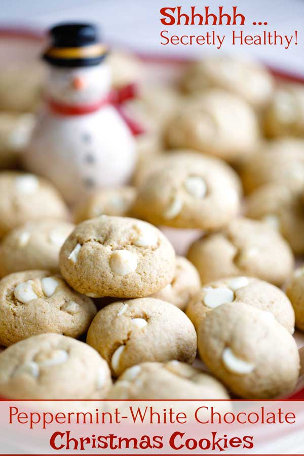 Chewy, buttery, guilt-free cookies filled with the perfect harmony of peppermint and creamy white chocolate! Surprise! These scrumptious “Chickpea” Cookies may taste just like “normal” cookies, but they’re secretly lower in fat, and higher in protein and fiber! Try these on your holiday cookie plate, and you'll be craving them all year 'round! | Christmas cookies | cookies healthy | chickpea cookies | chickpea recipes | protein cookies | #healthy #Christmas #cookies | www.twohealthykitchens.com