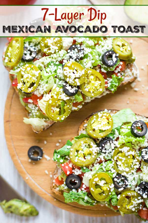 closeup of two slices, with the text overlay 7-Layer Dip Mexican Avocado Toast