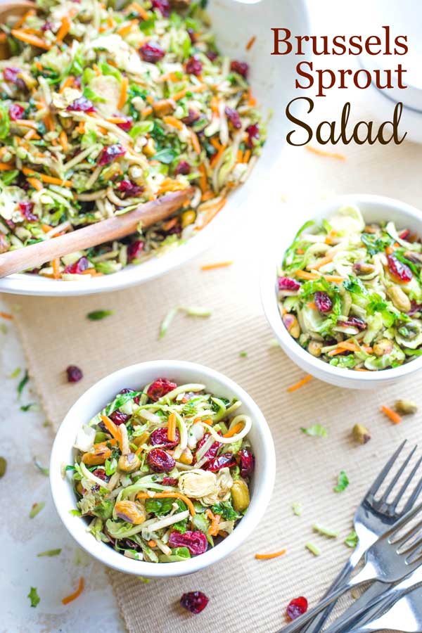 Salad in individual serving bowls with text "Brussels Sprout Salad" in upper corner