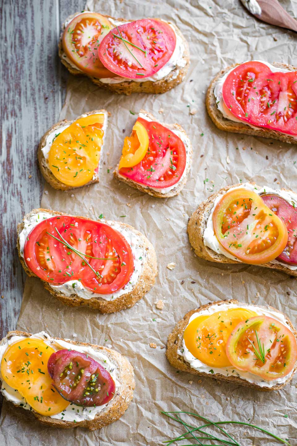 7 open-faced sandwiches, showing different varieties of tomato