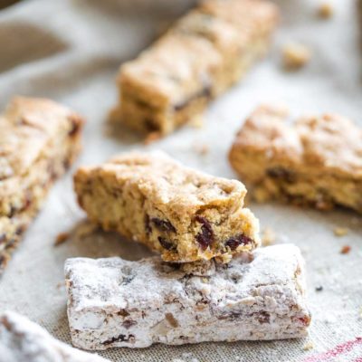 Closeup of one un-sugared bar leaning on one that's already been rolled in sugar.