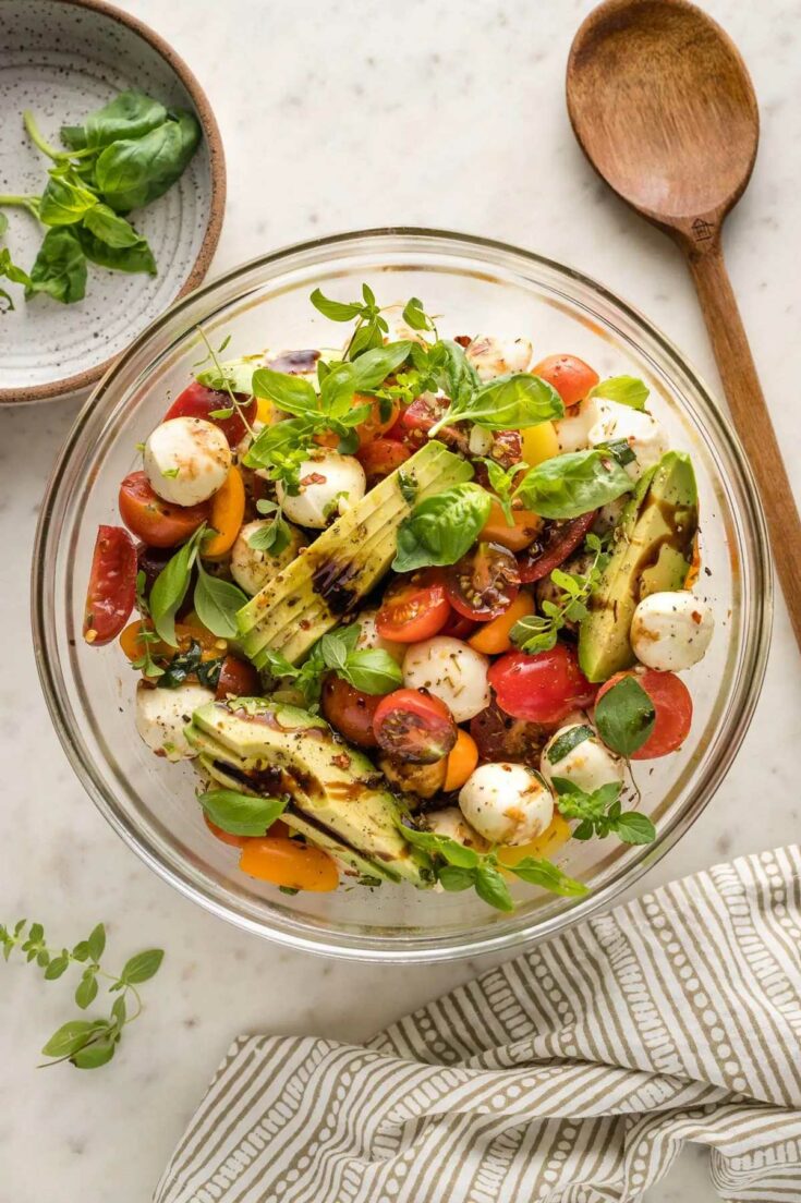 https://twohealthykitchens.com/wp-content/uploads/2022/06/Marinated-Mozzarella-Picnic-Salad-735x1104.jpg