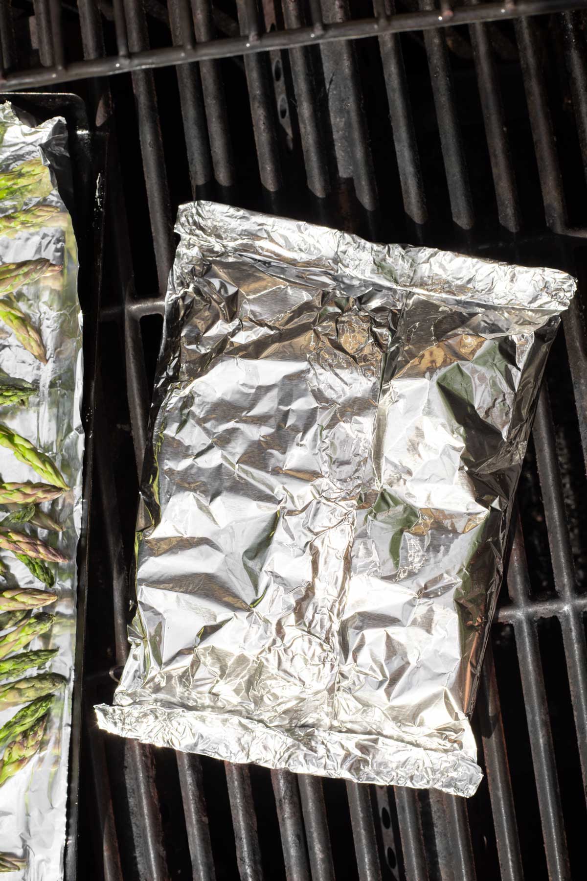 Foil packet on grill.