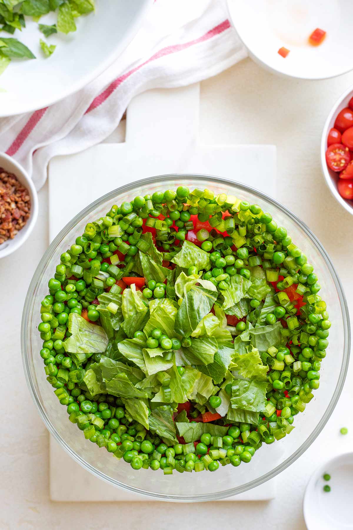 Layer 4: Green onions and peas.